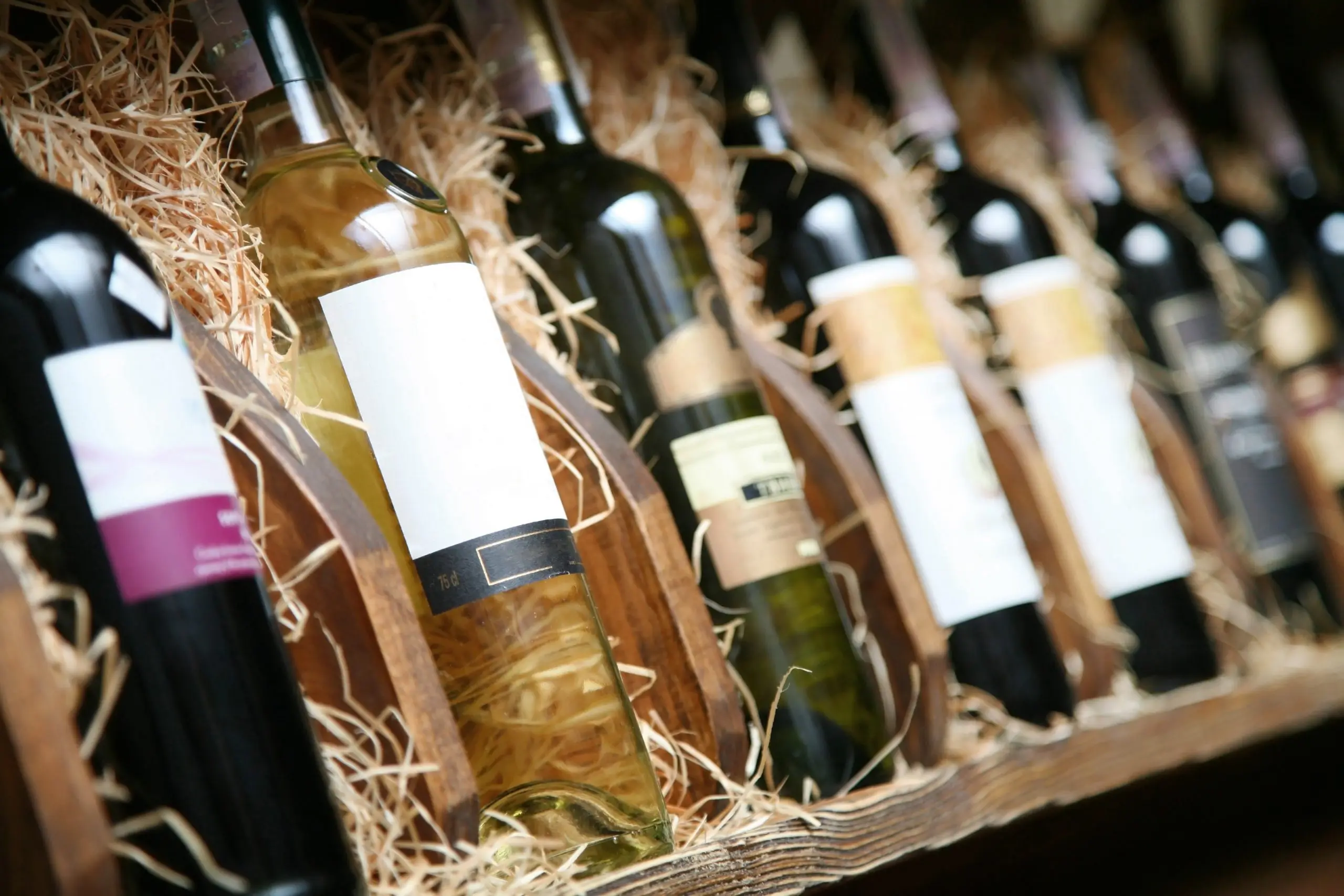 Wine bottle labels made with Kraton's tackifiers for adhesives, providing a clear finish with no discoloration