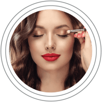 Color Cosmetics: Woman having eyeshadow applied